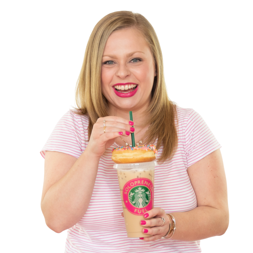 Alexandra of The Productivity Zone holding an iced coffee with a sprinkle doughnut on top