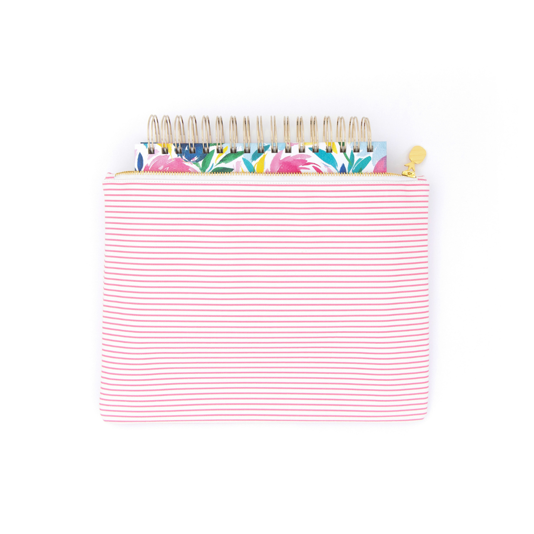 Happy Floral Daily Simplified Planner peeking out of a Pink Pinstripe Planner Pouch